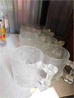 Eight glass Flintstones McDonald's mugs