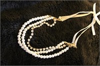 PEARL AND DIAMAND FASHION RIBBON NECKLACE