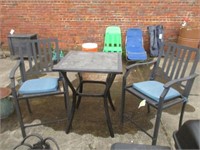 2 metal patio chairs and table
