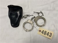 SMITH AND WESSON HAND CUFFS W- KEYS AND WILSON