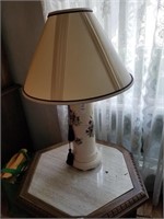 Lamp with floral motif