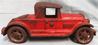 ANTIQUE RED CAST IRON TOY CAR BY A.C. WILLIAMS