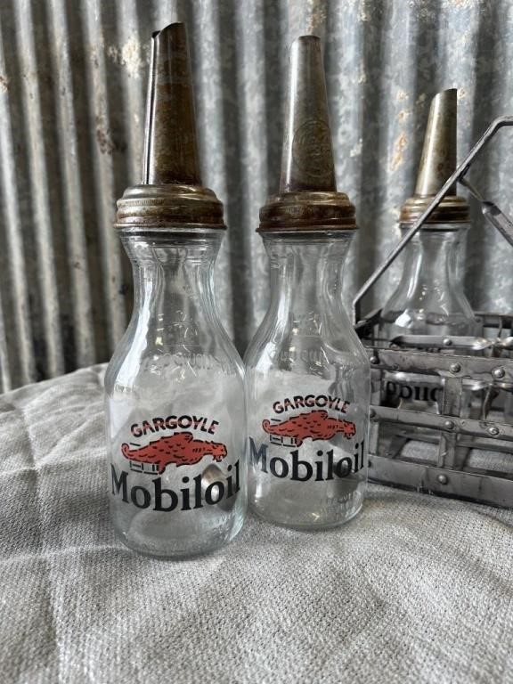 Vintage Oil bottles and metal carrying rack