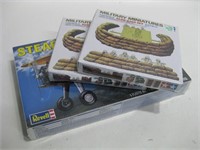 Three NIB Plastic Model Plane & Sand Bag Set