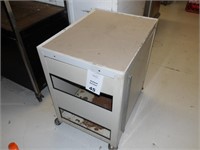 Metal cart on wheels with cabinet door