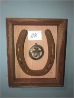 Tombstone badge and horseshoe