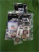 Group of nascar pins and a shelby pin