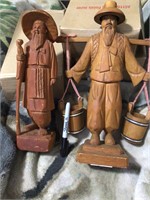 Two wood carving figures