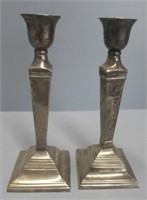 Pair of 11.75" tall silver plated candlesticks.