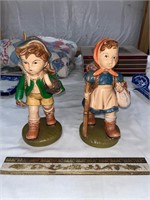 two large imitation hummel figurines