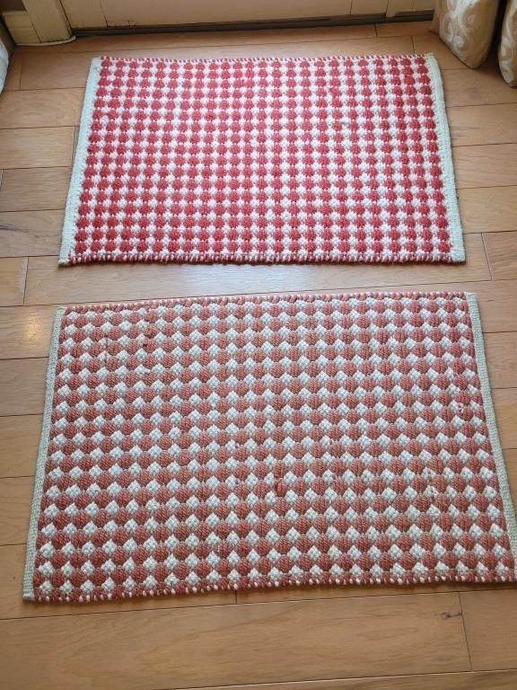 2 rugs from Crate and Barrel