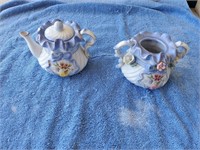 Fancy tea pot and sugar bowl