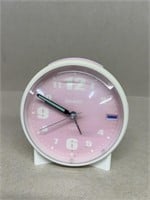 Sharp pink alarm clock