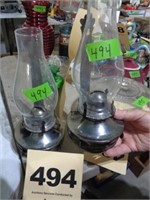 Two bracket oil lamps