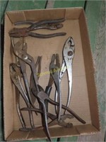 Assortment of pliers and channel locks