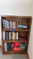 Books & shelf (42”H x 28”W x 9.5”D)