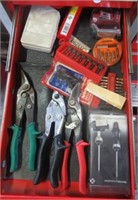 Contents of drawer that includes snips,