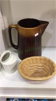 Antique pottery butter mold, brown glaze pitcher