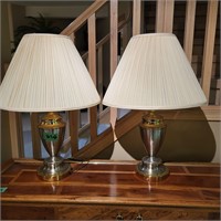 B202 Two silver and gold lamps