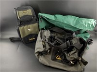 Lot with a Cabela's shooter's pouch, a range bag,