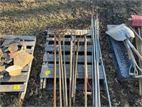 PALLET WITH PITCHFORKS, RAKES, METAL RODS