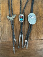 Three bolo ties