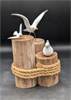 Decorative Ceramic Birds on Wood Posts