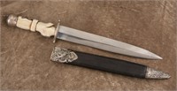 Carved ivory handled, double edged Dagger