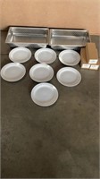 Stainless steel cooking container with plates