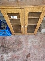 27 X 17 X 30 PRESSED WOOD  2 GLASS DOOR 3 SHELF