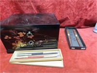 Black lacquered box, chopsticks.