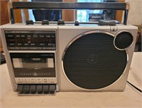 GE portable AM/FM radio with cassette deck.