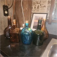 Five Reproduction Liquor Bottles