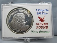 1986 Merry Christmas one troy silver ounce round.
