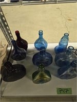 Colored, decanters, oil, lamps etc as shown