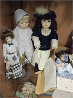 Seven collectors dolls as shown