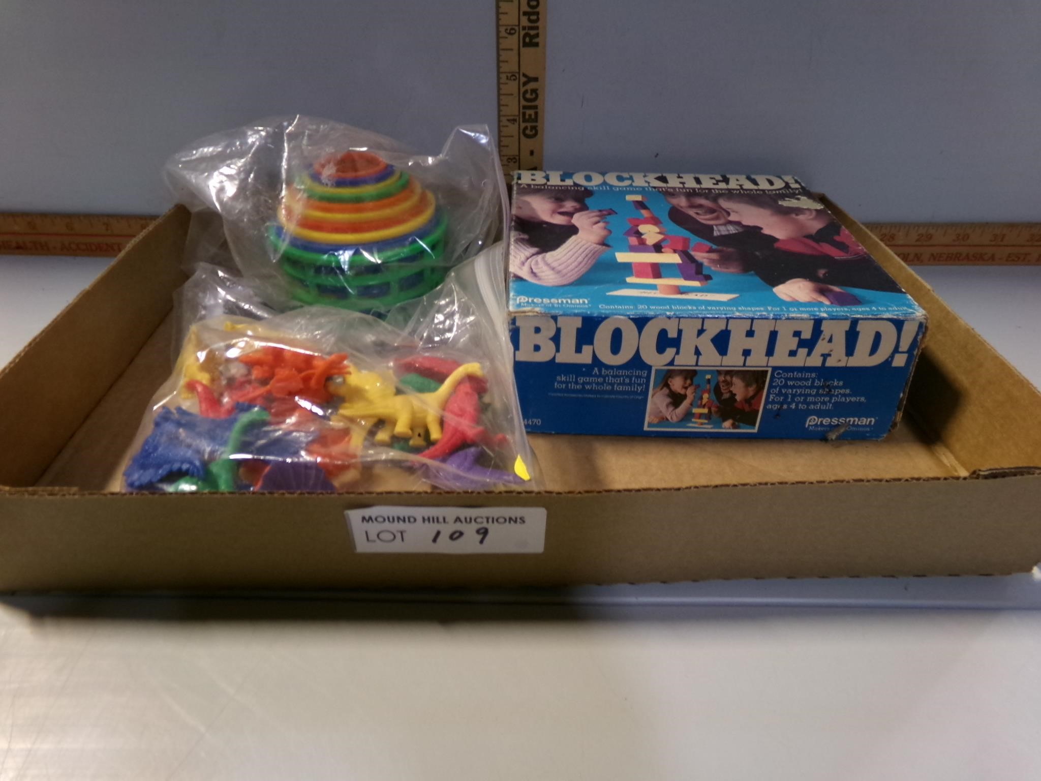 Plastic dinosaurs and blockhead game