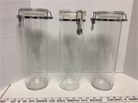 3 plastic canisters with locking lids 12.5 in
