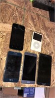Storage find electronic lot. 3 phones on bottom