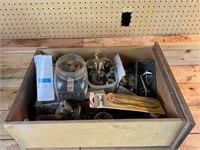 box of door knobs and hardware
