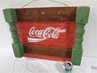 Homemade Coca-Cola Hat Rack, green posts