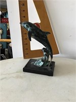 Brass dolphin figurine