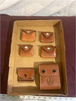 Flat of leather ammo pouches