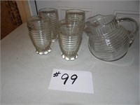 small clear pitcher and 4 glasses