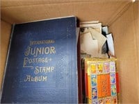Worldwide Stamps remainders in bankers box in albu