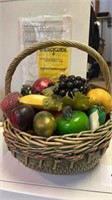 Basket full of decorative fruit and vegetables ,