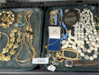 Two trays of jewelry
