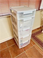 Large storage drawers filled with miscellaneous