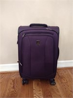 Travel Pro Rolling Purple Luggage