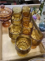 Amber colored drinking glasses and candy dish
